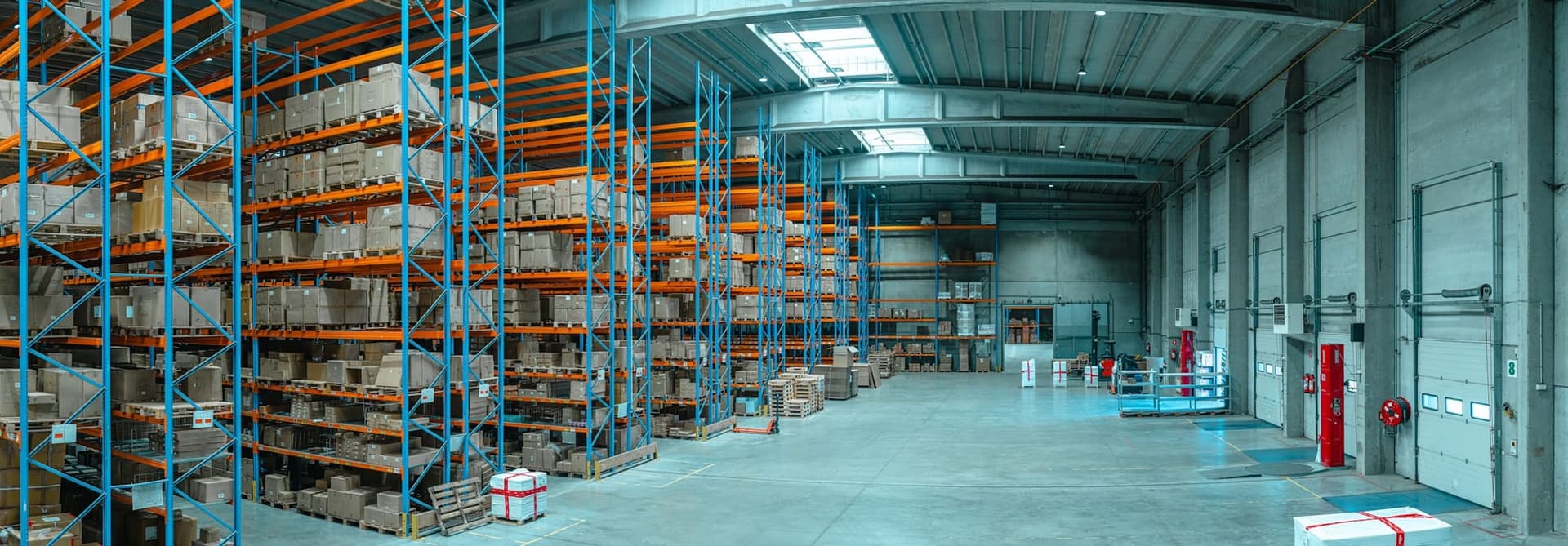 Wide view of pallet racking filled with cartons in a distribution warehouse